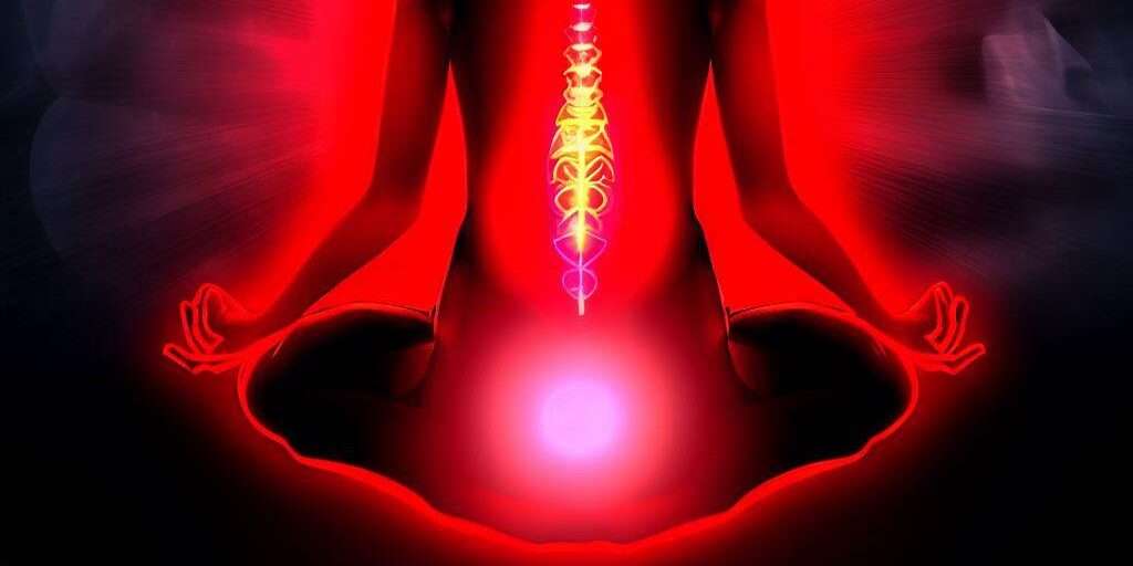 Person meditating and activating their Muladhara